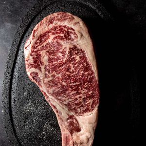 WAGYU CROSS WX RIBEYE C/HUESO 7+